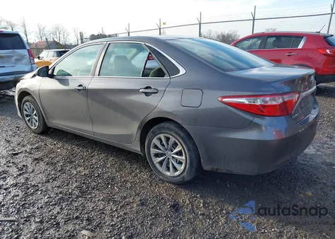 2016 Toyota Camry Le z USA, uszkodzony, nr VIN 4T4BF1FK1GR523053